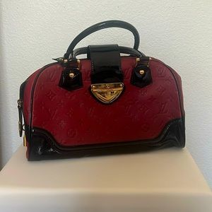 Black red and gold Louis Vuitton bag